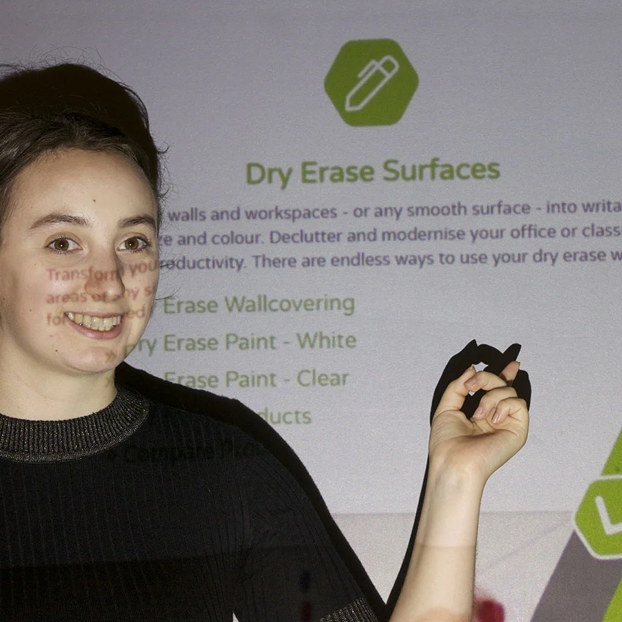 Presentation on clear projector screen paint surface